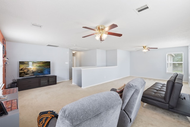 12007 Bach Orchard Trl, Houston, TX 77038 - living room with attic access, a ceiling fan, and light colored carpet