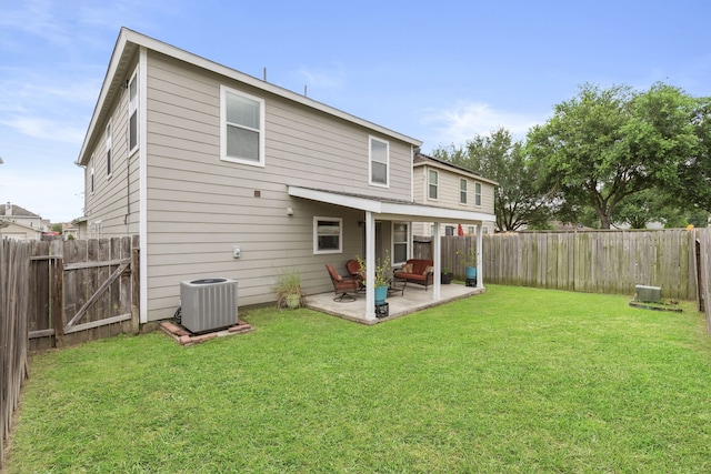 12007 Bach Orchard Trl, Houston, TX 77038 - rear view of house featuring central AC and a patio area