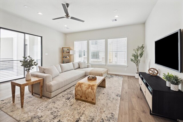 3037 Hicks St, Houston, TX 77007 - living area featuring light wood-type flooring, ceiling fan, baseboards, and recessed lighting