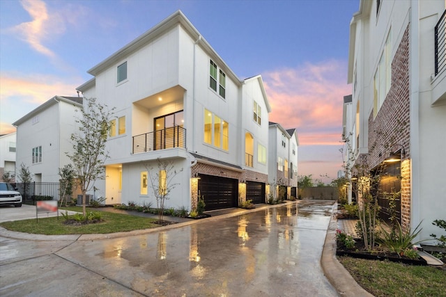 3037 Hicks St, Houston, TX 77007 - view of property with central AC unit, a garage, and concrete driveway
