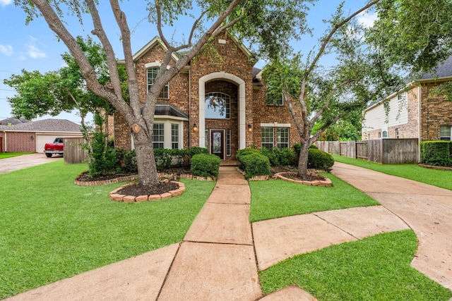 13202 Brushy Knoll Ln, Sugar Land, TX 77498 - traditional-style home with brick siding and concrete driveway