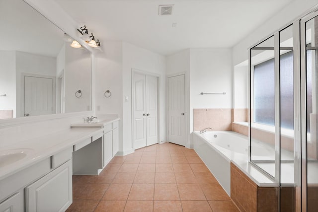 13202 Brushy Knoll Ln, Sugar Land, TX 77498 - full bathroom featuring tile patterned flooring, double vanity, and a tub with jets