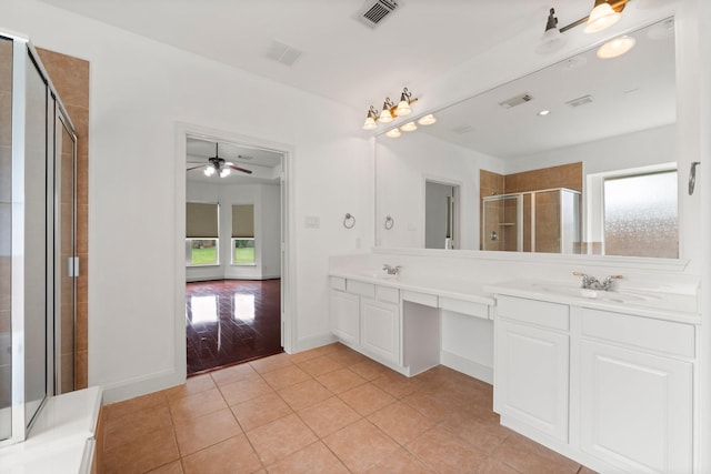 13202 Brushy Knoll Ln, Sugar Land, TX 77498 - bathroom with plenty of natural light, double vanity, a stall shower, and tile patterned floors