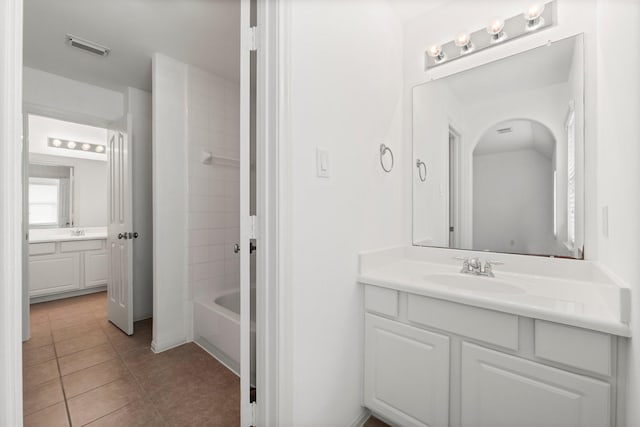 13202 Brushy Knoll Ln, Sugar Land, TX 77498 - full bathroom featuring vanity, tile patterned flooring, and tub / shower combination