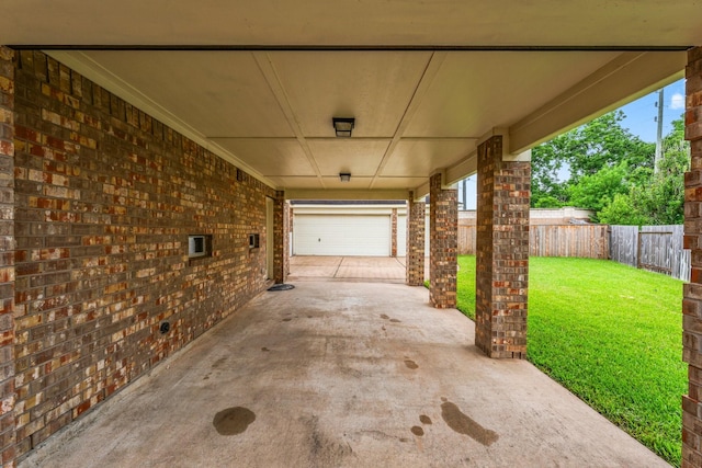 13202 Brushy Knoll Ln, Sugar Land, TX 77498 - view of patio / terrace with a garage