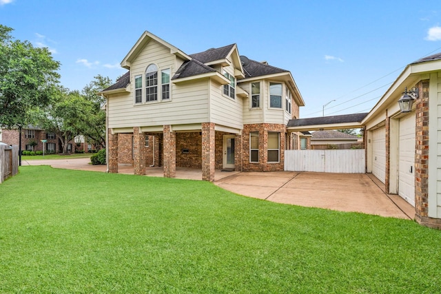 13202 Brushy Knoll Ln, Sugar Land, TX 77498 - back of property featuring roof with shingles, a patio, brick siding, and a garage