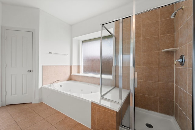13202 Brushy Knoll Ln, Sugar Land, TX 77498 - bathroom with a shower stall, a tub with jets, and tile patterned floors