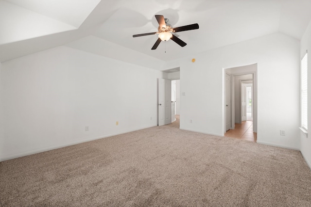 13202 Brushy Knoll Ln, Sugar Land, TX 77498 - unfurnished bedroom featuring light carpet, lofted ceiling, a ceiling fan, and baseboards