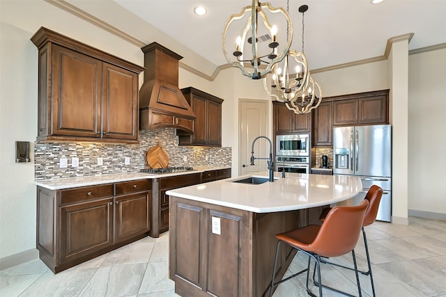 1530 Richland Hollow Ln, Friendswood, TX 77546 - kitchen with stainless steel appliances, a sink, a chandelier, custom exhaust hood, and light countertops