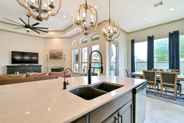 1530 Richland Hollow Ln, Friendswood, TX 77546 - kitchen featuring a sink, a chandelier, crown molding, dishwasher, and light countertops