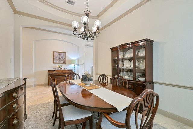 1530 Richland Hollow Ln, Friendswood, TX 77546 - dining space with a raised ceiling, light tile patterned flooring, ornamental molding, a chandelier, and baseboards