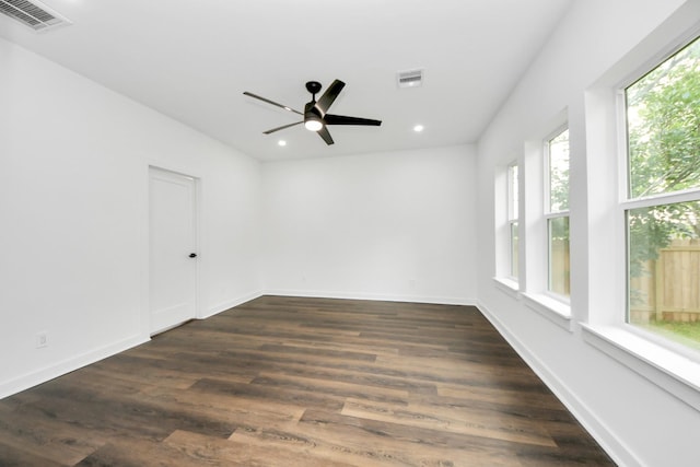 7440 Avenue E Ave E, Beasley, TX 77417 - spare room featuring recessed lighting, a ceiling fan, dark wood-style flooring, and baseboards