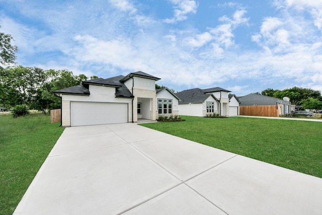 7440 Avenue E Ave E, Beasley, TX 77417 - view of front of home with concrete driveway, a garage, and roof with shingles