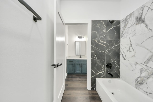 7440 Avenue E Ave E, Beasley, TX 77417 - bathroom featuring vanity, shower / washtub combination, and wood finished floors