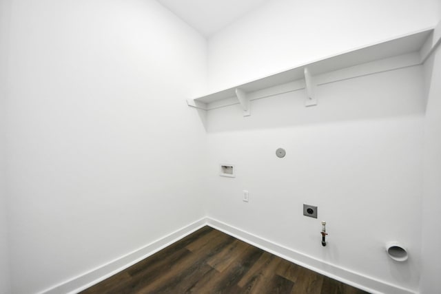 7440 Avenue E Ave E, Beasley, TX 77417 - laundry room with hookup for a gas dryer, electric dryer hookup, baseboards, dark wood-style flooring, and hookup for a washing machine
