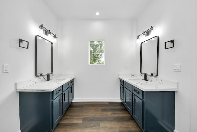 7440 Avenue E Ave E, Beasley, TX 77417 - bathroom with wood finished floors, double vanity, baseboards, and recessed lighting