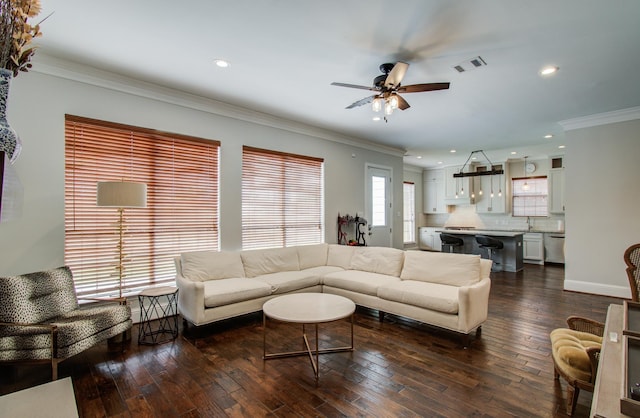 4303 Jonathan St, Bellaire, TX 77401 - living room with dark wood-style floors, ceiling fan, recessed lighting, crown molding, and baseboards