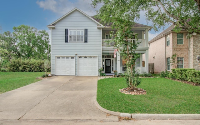 4303 Jonathan St, Bellaire, TX 77401 - view of front facade featuring covered porch, a balcony, a front yard, concrete driveway, and a garage