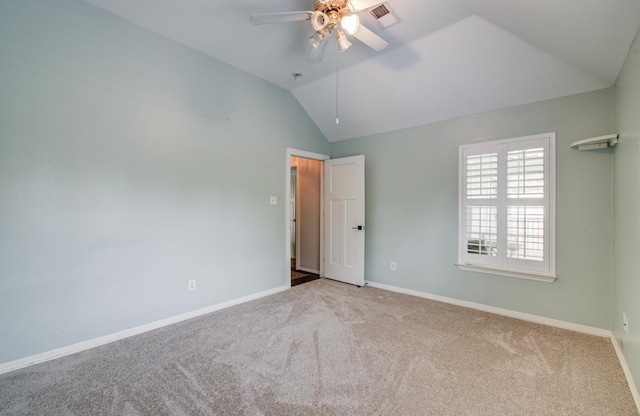 4303 Jonathan St, Bellaire, TX 77401 - unfurnished bedroom featuring carpet flooring, lofted ceiling, baseboards, and ceiling fan