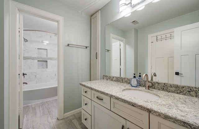 4303 Jonathan St, Bellaire, TX 77401 - bathroom with vanity, shower / washtub combination, and baseboards