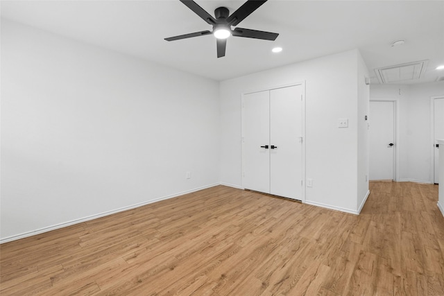 20419 Thunder Ridge Ln, Katy, TX 77449 - unfurnished bedroom featuring attic access, light wood-type flooring, recessed lighting, baseboards, and a closet