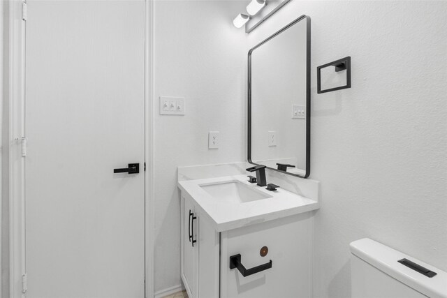 20419 Thunder Ridge Ln, Katy, TX 77449 - half bathroom featuring vanity and toilet