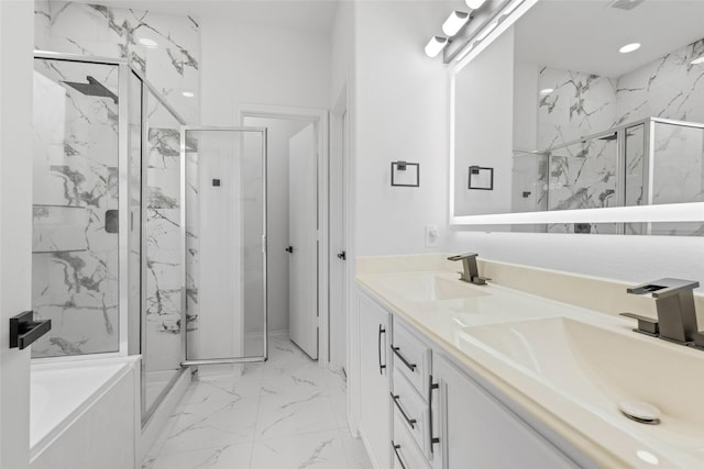 20419 Thunder Ridge Ln, Katy, TX 77449 - bathroom featuring marble finish floors, a marble finish shower, double vanity, a garden tub, and recessed lighting