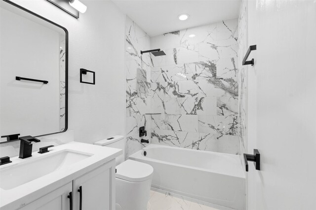 20419 Thunder Ridge Ln, Katy, TX 77449 - bathroom featuring marble look tiles, vanity, toilet, washtub / shower combination, and recessed lighting