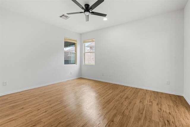 20419 Thunder Ridge Ln, Katy, TX 77449 - spare room with light wood-style flooring, a ceiling fan, baseboards, and recessed lighting