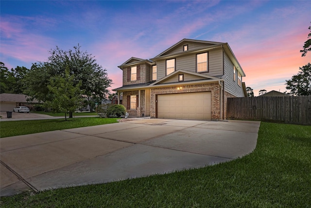 703 Windlass Way, Crosby, TX 77532 - traditional-style house with concrete driveway, brick siding, and an attached garage