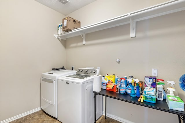 703 Windlass Way, Crosby, TX 77532 - laundry area with washing machine and dryer and baseboards