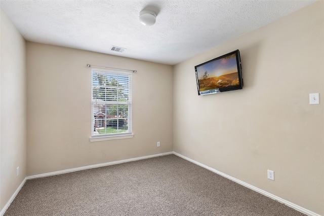 703 Windlass Way, Crosby, TX 77532 - carpeted empty room with baseboards and a textured ceiling