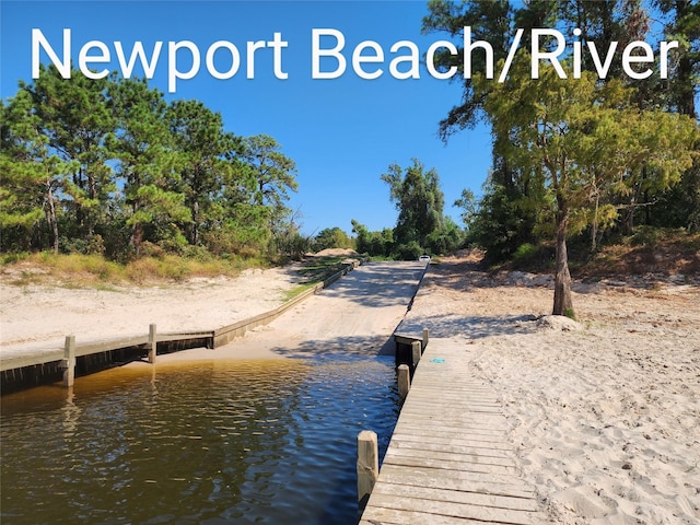 703 Windlass Way, Crosby, TX 77532 - dock area with a boat ramp and a water view