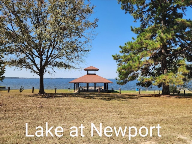 703 Windlass Way, Crosby, TX 77532 - view of community with a gazebo, a yard, and a water view