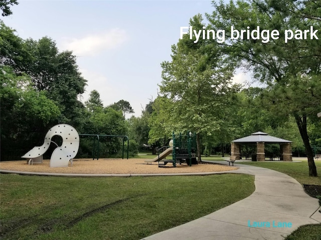 703 Windlass Way, Crosby, TX 77532 - community play area featuring a lawn and a gazebo