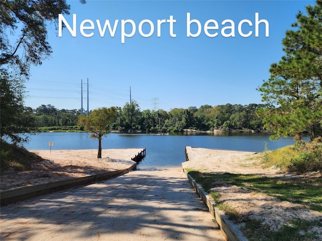 703 Windlass Way, Crosby, TX 77532 - dock featuring a boat ramp and a water view