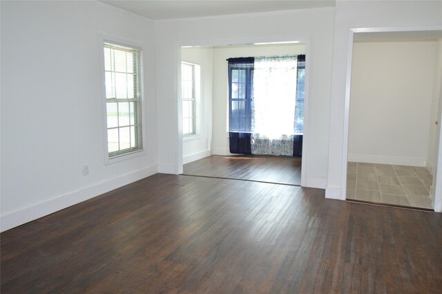 405 W Jack St, Baytown, TX 77520 - unfurnished room with wood finished floors and baseboards