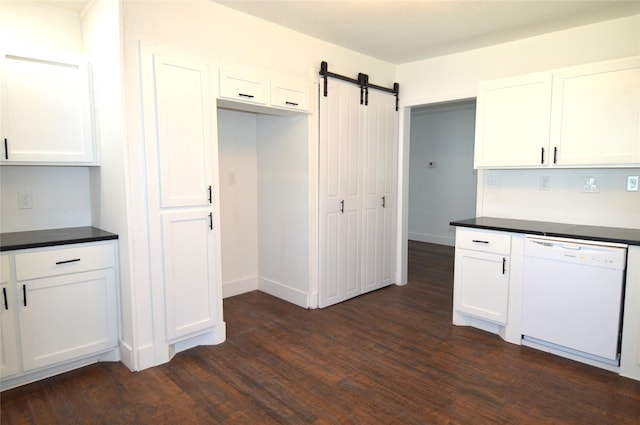 405 W Jack St, Baytown, TX 77520 - kitchen featuring white dishwasher, a barn door, dark countertops, white cabinetry, and dark wood finished floors
