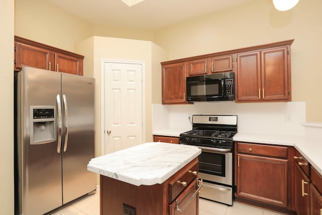 8006 Virginia Water Ln, Houston, TX 77095 - kitchen featuring stainless steel appliances, light tile patterned flooring, and a center island