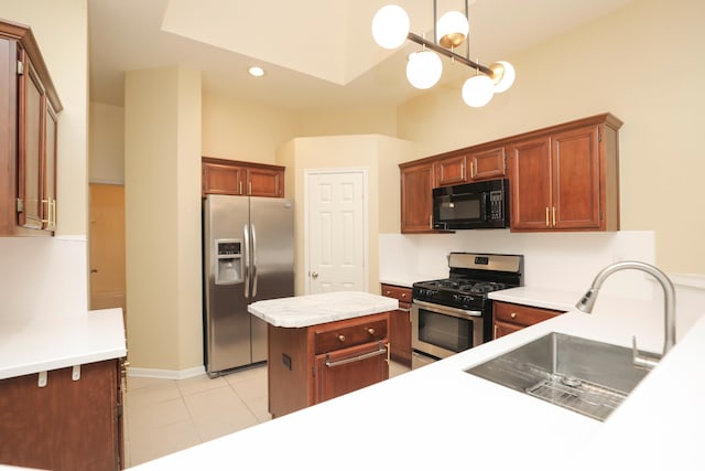 8006 Virginia Water Ln, Houston, TX 77095 - kitchen featuring appliances with stainless steel finishes, light countertops, light tile patterned flooring, a center island, and recessed lighting