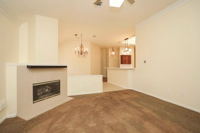 8006 Virginia Water Ln, Houston, TX 77095 - unfurnished living room featuring light colored carpet, a chandelier, a tile fireplace, and crown molding