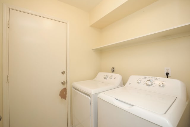 8006 Virginia Water Ln, Houston, TX 77095 - washroom with washer and clothes dryer