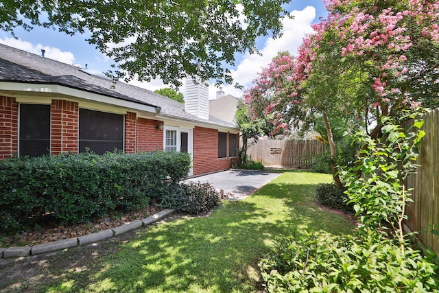 8006 Virginia Water Ln, Houston, TX 77095 - view of yard with a patio area