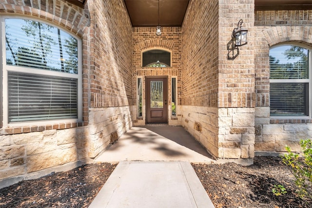 234 Feldspar Ln, Huntsville, TX 77340 - entrance to property with stone siding and brick siding