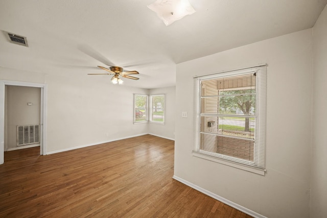 5814 Darnell St, Houston, TX 77074 - unfurnished room featuring baseboards, wood finished floors, and ceiling fan