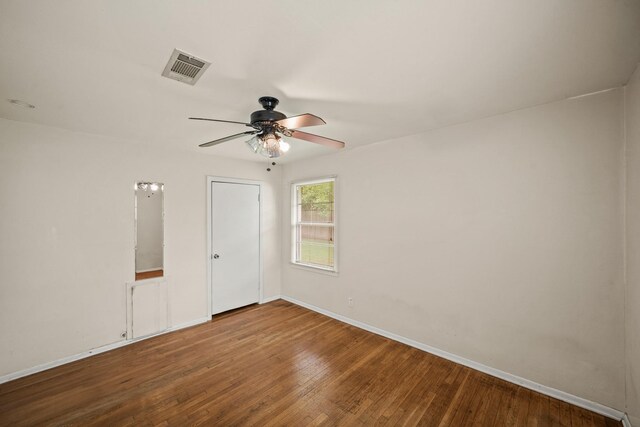 5814 Darnell St, Houston, TX 77074 - unfurnished room with ceiling fan, wood finished floors, and baseboards