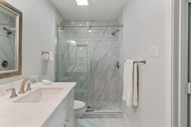 820 Threadneedle St Unit 248, Houston, TX 77079 - bathroom with vanity, a marble finish shower, and marble look tiles