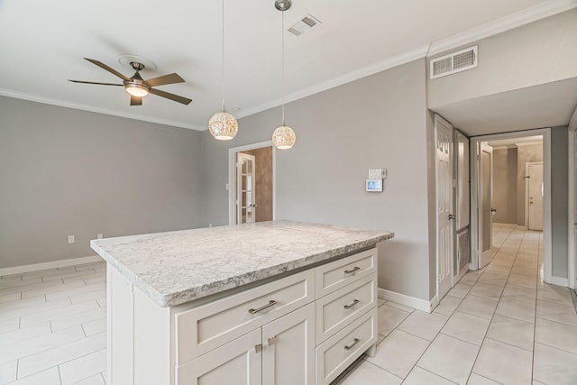 820 Threadneedle St Unit 248, Houston, TX 77079 - kitchen featuring a ceiling fan, light tile patterned flooring, crown molding, hanging light fixtures, and white cabinets