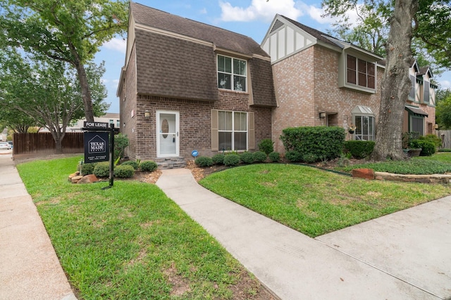 820 Threadneedle St Unit 248, Houston, TX 77079 - view of front facade with a shingled roof and brick siding