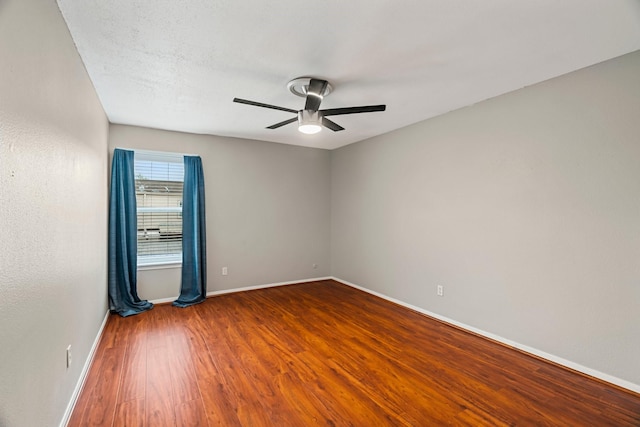 820 Threadneedle St Unit 248, Houston, TX 77079 - empty room with a ceiling fan and wood finished floors